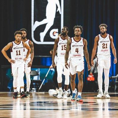 Squad. The Charge in their white unis.