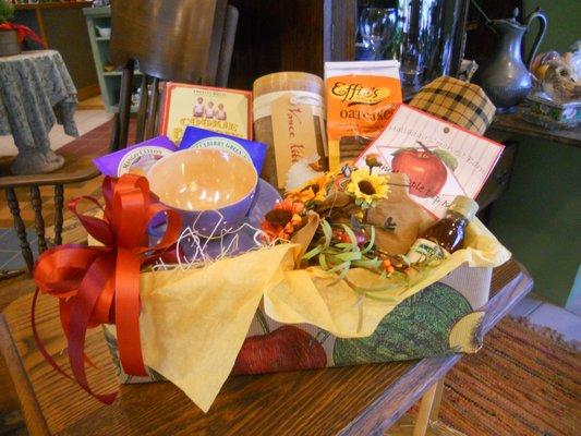 We do up our interpretation of a gift basket...we call it a "Twitter Box".  We work with you and your budget to select the items and then...