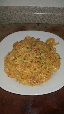 Cajun shrimp and crawfish pasta in a creamy homemade Alfredo sauce.