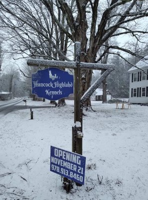 Hancock Highland Kennels business sign, marks the entrance from the road.