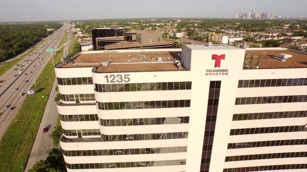 Telemundo Houston KTMD 1235 North Loop West Houston, TX 77008 - drone shot with downtown and 610 Freeway.