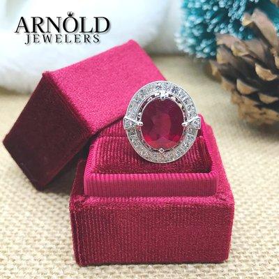 Ruby ring with diamond halo