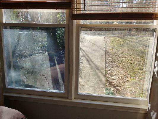 This window (on left) has tint installed. Window on right does not. Drastic difference in sunlight and heat blocked..but can still see out.