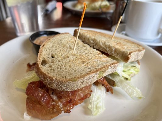 B.A.L.T. (Bacon, avocado, lettuce and tomato) on rye toast. The "avocado" was a super thin layer of guacamole.