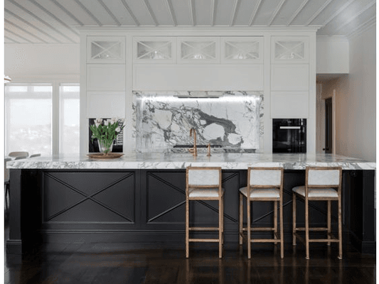 A contrast in Black And White with Marble tops in both Black and White .