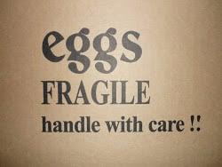 Egg box--"Eggs. FRAGILE. Handle with care!"