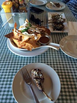 Lamb lollipops and pulled pork nachos !! Lamb was to die for ..