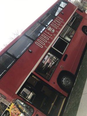 Coffee shop in a bus, seating up stairs.