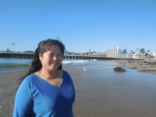 Amy Zhan, owner of Deep Traditional Massage enjoying a walk on the beach.