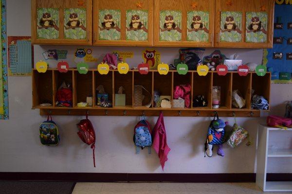 Each child gets their own cubby to store their things. (Toddler and Three years old)