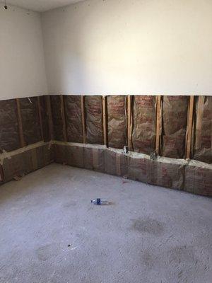 Demolition and dry out walls after water flooding