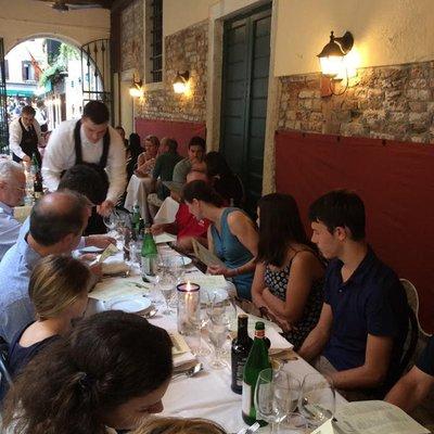 Our tour enjoying dinner at a local authentic Italian restaurant