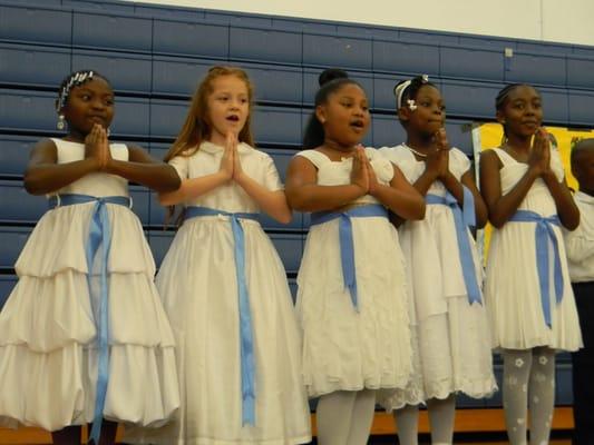 School children singing