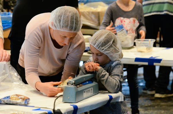 Hosting Feed My Starving Children MobilePack and making meals to be distributed throughout the world.