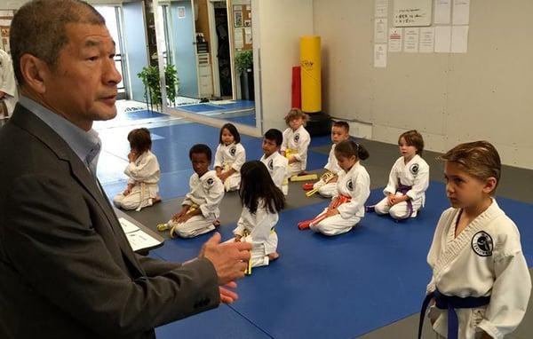 The Grandmaster and students at a recent karate examination.