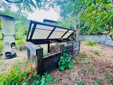 Angela built us an incredible working compost bin!