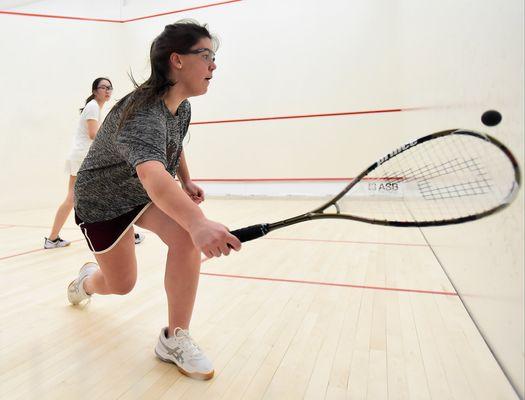 The varsity squash team plays home matches on the LCDS courts.