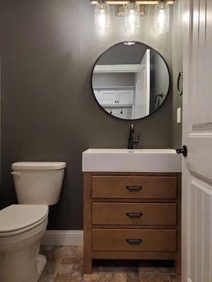 Powder bath with vanity, top and mirrors owner found online.