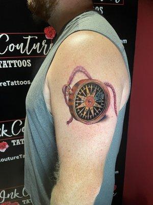 My Husband's compass. The stencil was loving his skin under the rope! :)