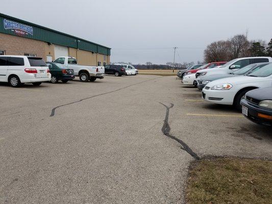 Our parking area as you enter from the street.