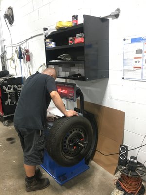 Mount and balance tire