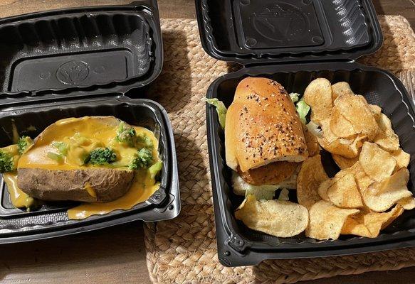 Loaded baked potato with fresh broccoli and homemade cheese sauce and a garlic parm chicken sandwich with a everything bagel roll