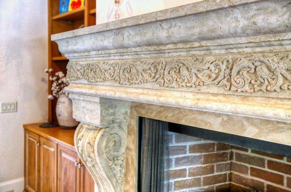 Traditional Cast Stone Mantel Featuring Ornate Frieze