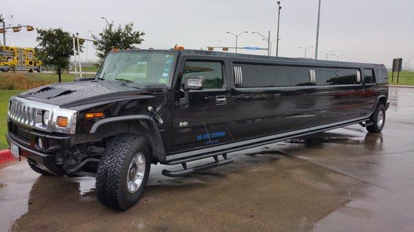 16 passenger Hummer.