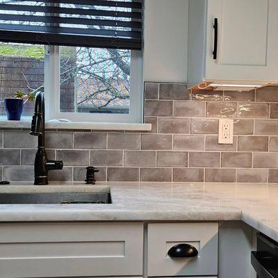 Installed these subway tiles and finished with black schluter tile edge.