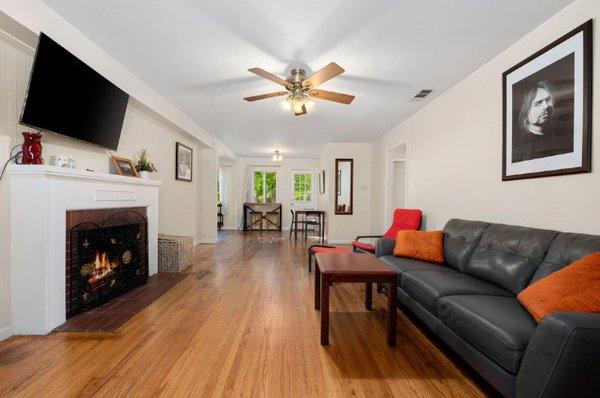 Living room of the house with paintings on the wall and modern furniture