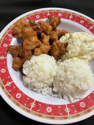 Deep fried chicken, rice and potato salad