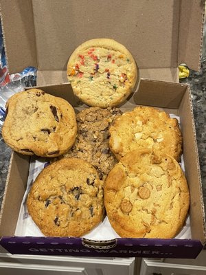 Oatmeal Chocolate Walnut Deluxe, White Chocolate Macadamia, Peanut Butter Chip, Chocolate Chunk, Oatmeal Raisin, Vegan Birthday Cake.