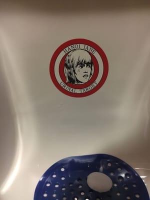 In a urinal. Awesome