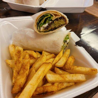 Falafel wrap and seasoned fries