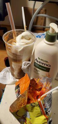 Hot Cheetos with nacho cheese, and root beer float. Lotion bottle for scale