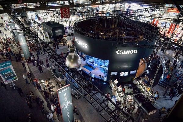 Marketing photo of a trade show floor for Canon.