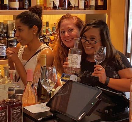 Karen F and Anna M are sampling different gins at Bern's Fine Wine & Spirits in honor of World Gin Day. FIVE STAR CHEERS