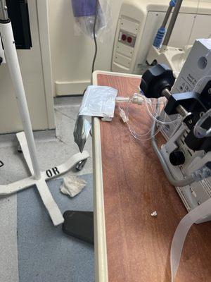 The Empty IV bag was left on the table next to the IV machine