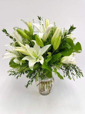 Serenity | Carefully hand-selected, our premium lilies are known for their pristine beauty and delicate fragrance.