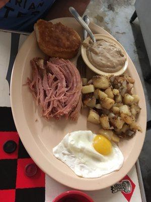 This is the smoked country ham, gravy, sunny side egg, and home fries