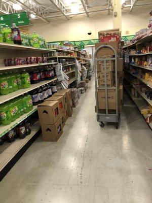 Aisle after aisle, boxes of products stacked high and the floors are super dirty!!