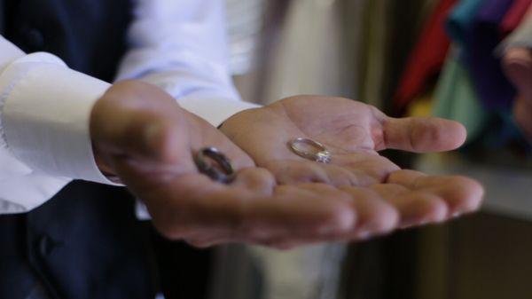 Wedding rings in hands.