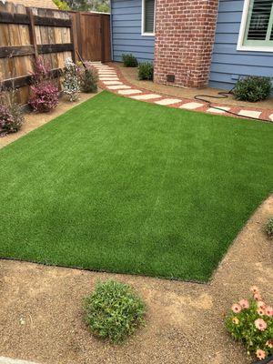 Turf installation and 
lava rock with stepping stone walk way
Plants with irrigation