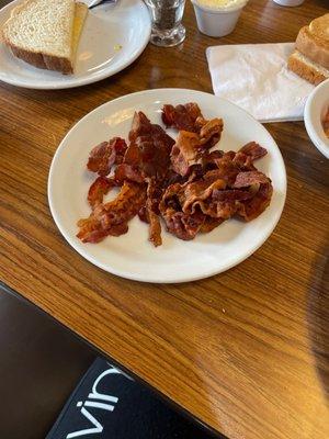 This is the bacon I was served after asking them to cook the uncooked bacon brought out to me 2 previous times.