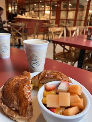 Croissant sandwich with fruit. Irish crème coffee.