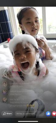 My granddaughters playing with my bubbles in my hot tub