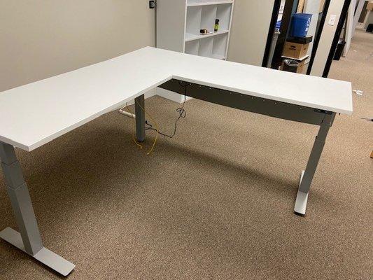 Used L Electric Sit to Stand Desks