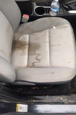 Before photo of passenger seat with stains