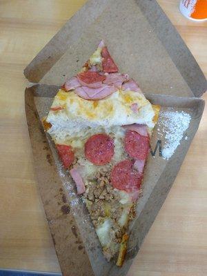 Stuffed meat lovers slice of pizza for $5.65+tax.  Here it is opened up.