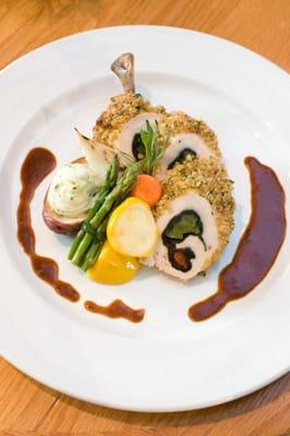 Chicken stuffed with spinach and seasonal steamed vegetables served with a home made balsamic vinaigrette dressing